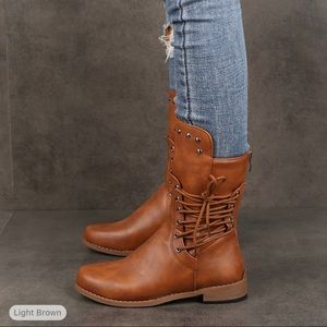 Shin height boots, brand new never worn.